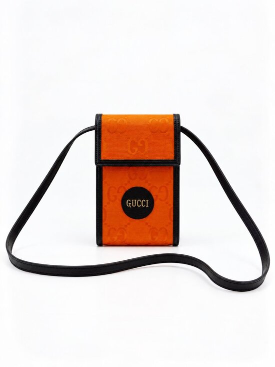 Gucci Handbags - Gucci GG Monogram Orange Mini Crossbody Phone Bag